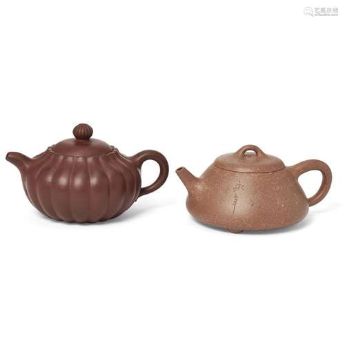 Two Chinese Yixing teapots<br />
<br />
20th century<br />
<...