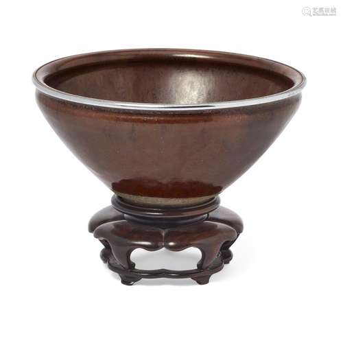 A Chinese brown-glazed tea bowl with silvered metal rim<br /...