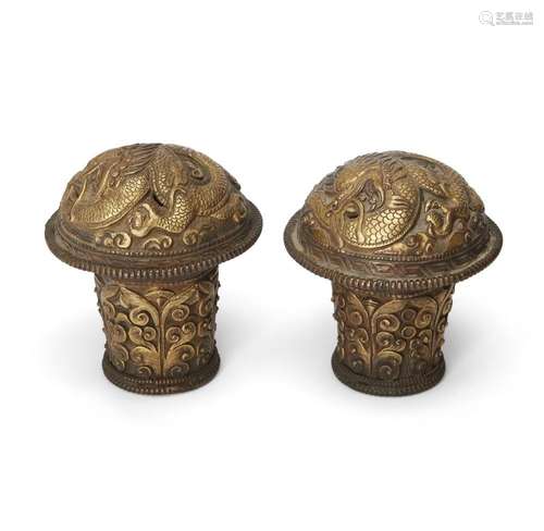 A pair of Tibetan 'dragon' Thangka scroll ends<br />
<br />
...