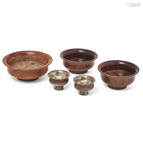 Five Tibetan wood bowls<br />
<br />
Late 19th - 20th centur...