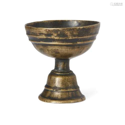 A Tibetan Bön tradition copper alloy butter lamp<br />
<br /...