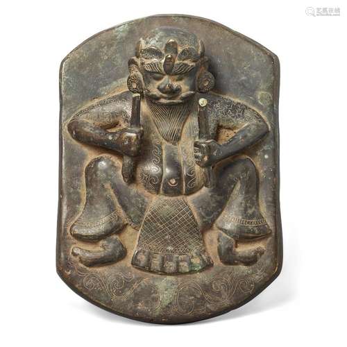 A Tibetan bronze plaque<br />
<br />
18th/19th century<br />...