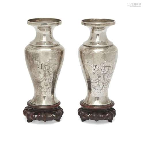 A pair of Japanese silver vases <br />
<br />
Meiji period, ...