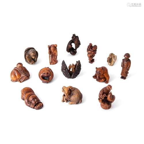 A group of twelve Japanese netsuke and a small nut okimono<b...