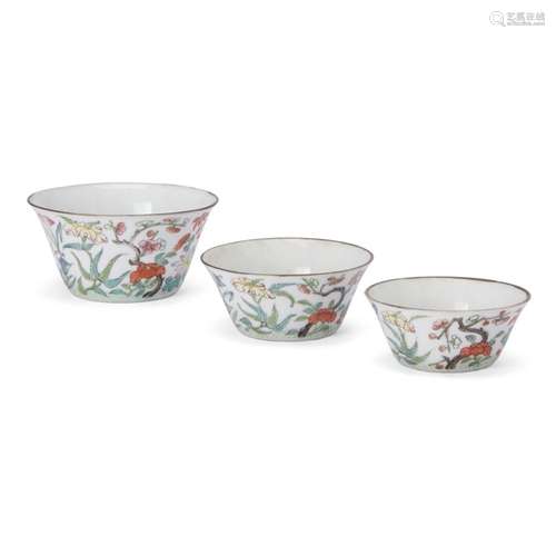 A part-set of three Chinese famille rose 'floral' nesting cu...