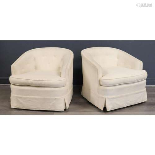 A Midcentury Pair Of Upholstered Swivel Chairs.