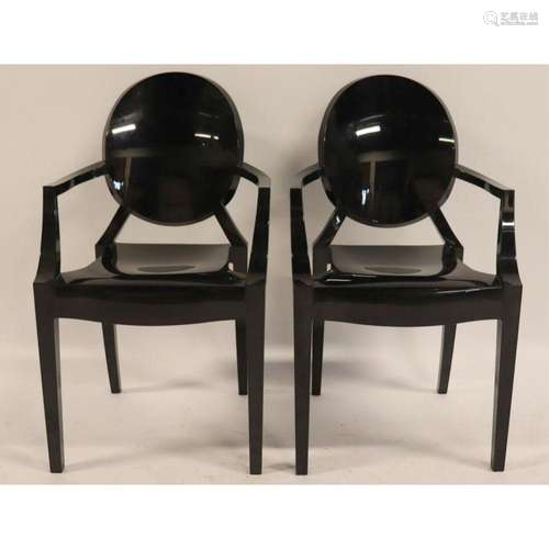 A Pair Of Kartell ghost Chairs By Starck.