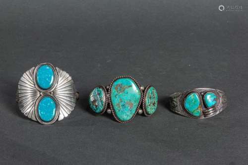 Three Navajo turquoise mounted silver cuff bracelets, one ma...