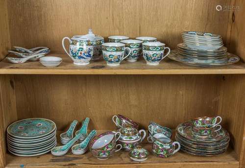 Two shelves of Chinese porcelain table articles, including r...