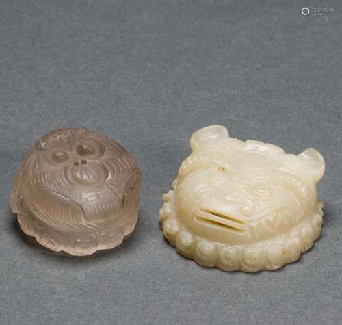 Two Chinese hardstone and glass 'lion mask' buttons