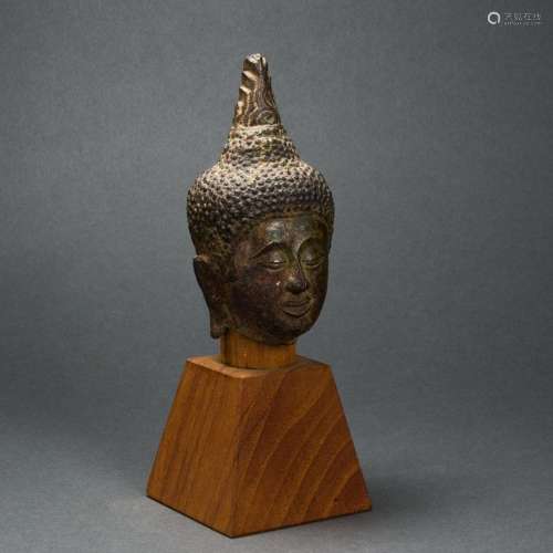 Southeast Asian buddhist bronze head with wooden base