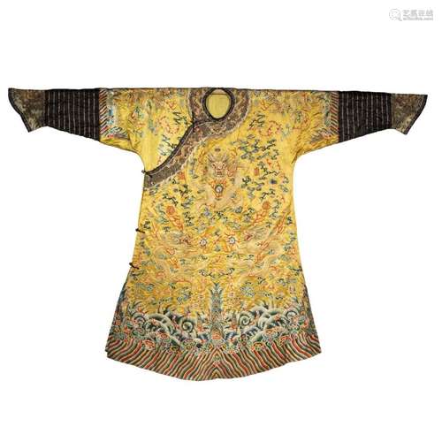 Imperial embroidered yellow silk twelve-symbol dragon robe f...