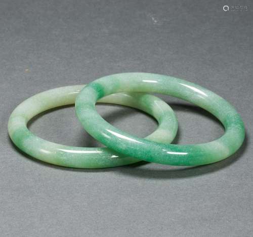 Two Chinese green jadeite bangles