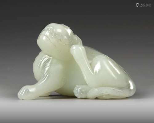 A PALE CELADON JADE CARVING OF A LION, QING DYNASTY (1644–19...