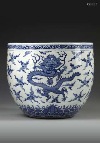 A LARGE CHINESE BLUE AND WHITE "DRAGONS" BOWL, 19T...
