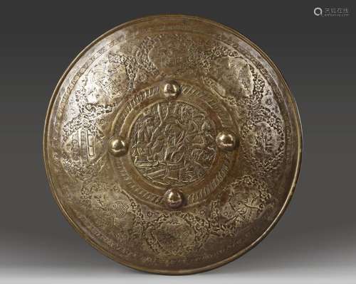 A QAJAR GILT COPPER SHIELD, PERSIA, 19TH CENTURY