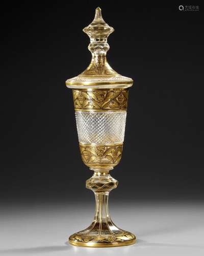 A HAND PAINTED AND HAND CARVED BACCARAT GOBLET WITH COVER, F...