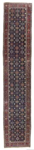 A BIDJAR RUNNER WITH MINA KHANI DESIGN, LATE 19TH CENTURY