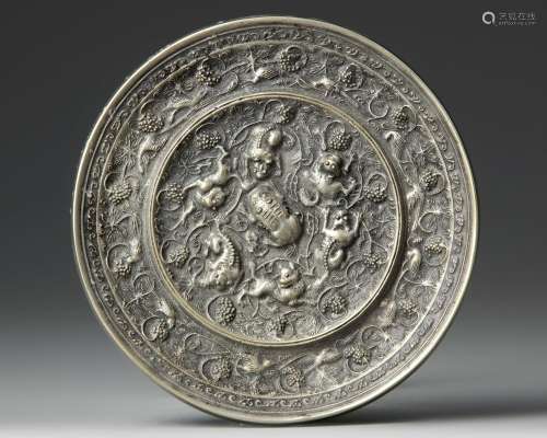 A CHINESE CIRCULAR "LIONS AND BIRDS" SILVER MIRROR...