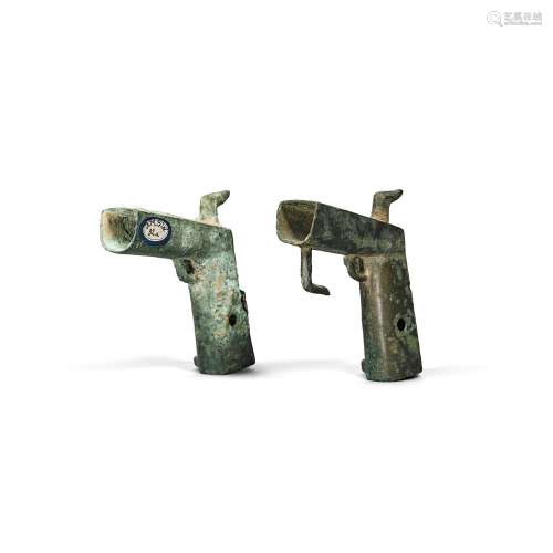 Two archaic bronze chariot fittings, Warring States period