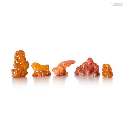 A group of three amber carvings, Qing dynasty, 19th century