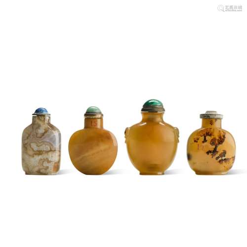 A group of four agate snuff bottles, Qing dynasty, 19th cent...