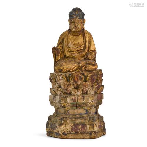 A gilt-decorated wood figure of a Buddha, Ming dynasty