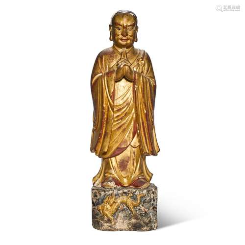 A large gilt-lacquered wood figure of a Luohan, 17th / 18th ...