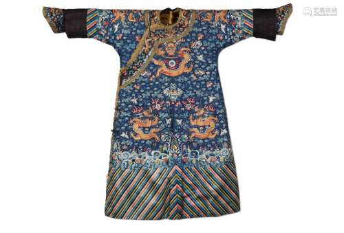 A blue-ground embroidered silk 'dragon' winter robe, Qing dy...