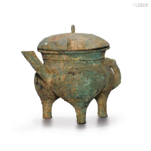 An archaic bronze tripod ritual wine vessel and cover (He), ...