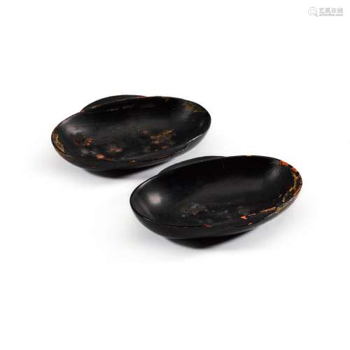 A pair of black lacquer 'ear cups', Han dynasty