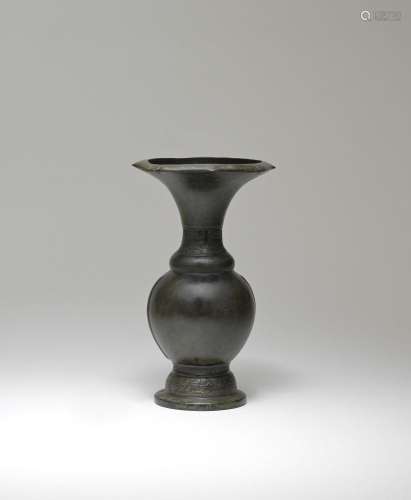 A RARE BRONZE TRUMPET-NECKED PEAR-SHAPED VASE  12th/13th cen...