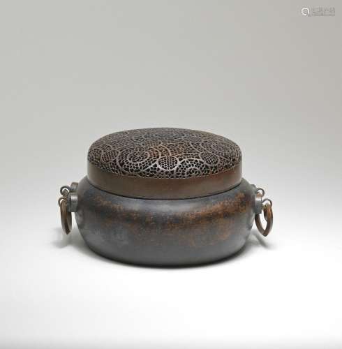 A LARGE CIRCULAR BRONZE WARMER AND RETICULATED COVER  18th c...