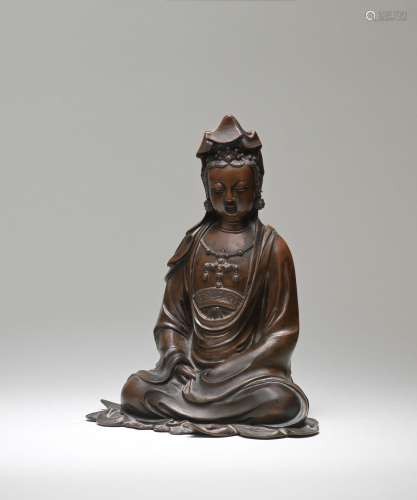 A RARE DOCUMENTARY BRONZE SEATED FIGURE OF GUANYIN  17th cen...