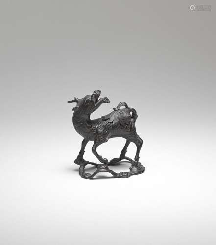 A BRONZE 'QILIN' INCENSE BURNER AND COVER 17th century