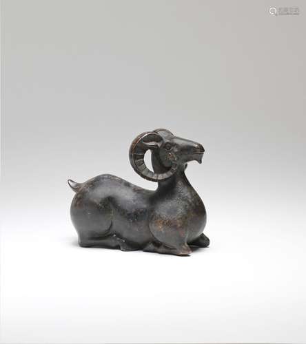 A BRONZE MODEL OF A RECUMBENT RAM 16th/17th century