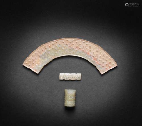 A GROUP OF THREE ARCHAIC JADE CARVINGS  Eastern Zhou/Han Dyn...