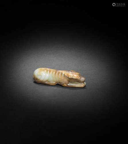 A PALE GREEN AND RUSSET JADE CARVING OF A HOUND Song/Ming Dy...