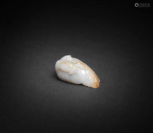 A GREYISH-WHITE AND RUSSET JADE CARVING OF A GOOSE AND LINGZ...