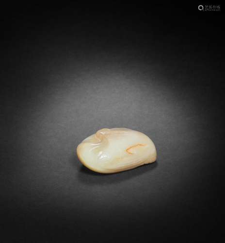 【Y】A PALE GREEN AND RUSSET JADE CARVING OF A CRANE Song Dyna...