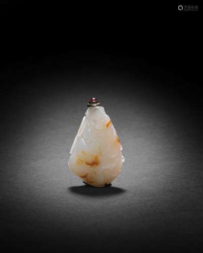 A WHITE AND RUSSET JADE 'GOURD AND BUTTERFLY' SNUFF BOTTLE 1...
