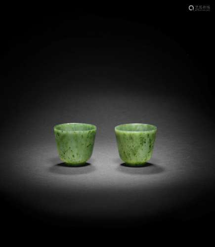【*】A PAIR OF SPINACH-GREEN JADE CUPS Qianlong/Jiaqing  (2)