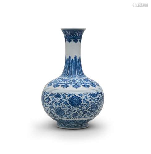 A RARE MING-STYLE BLUE AND WHITE LOTUS-SCROLL BOTTLE VASE Qi...