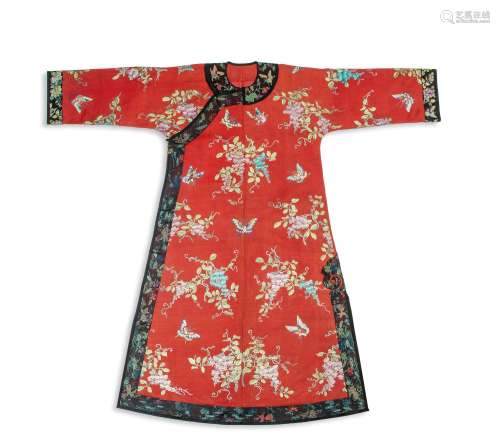 A MANCHU WOMAN'S RED-GROUND GAUZE SILK EMBROIDERED ROBE, CHA...