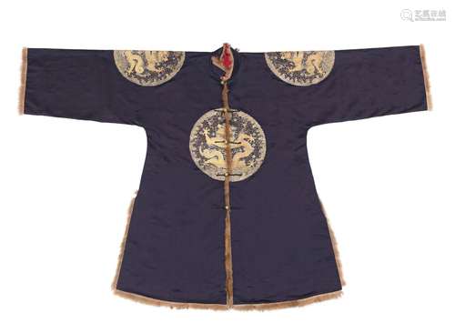 【*】AN IMPERIAL MIDNIGHT-BLUE GROUND FUR-TRIMMED SILK SURCOAT...