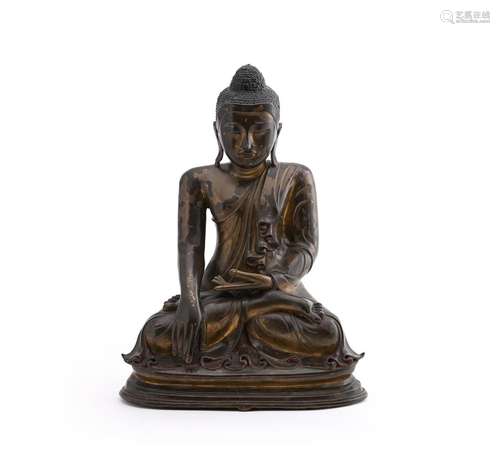 A large Burmese Mandalay style bronze figure of Buddha Shaky...