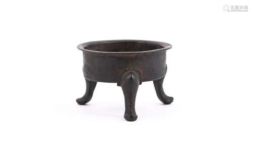 A Chinese bronze tripod censer