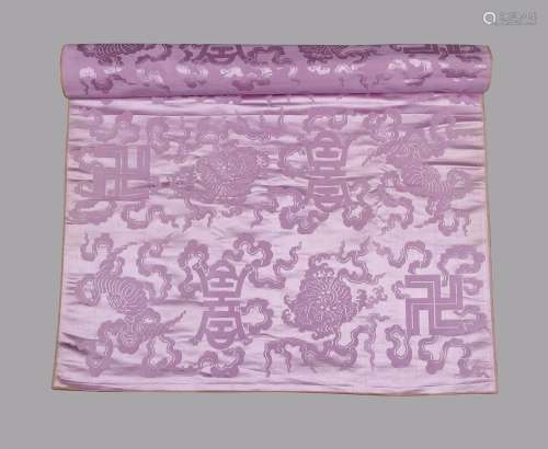 A Chinese lilac bolt of silk damask woven with bold symbols ...