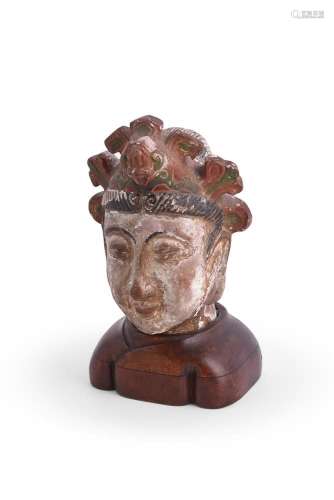 † A Chinese painted terra cotta head of bodhisattva