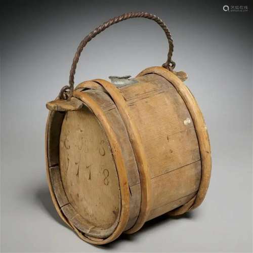 Antique wrought iron mounted staved wood barrel